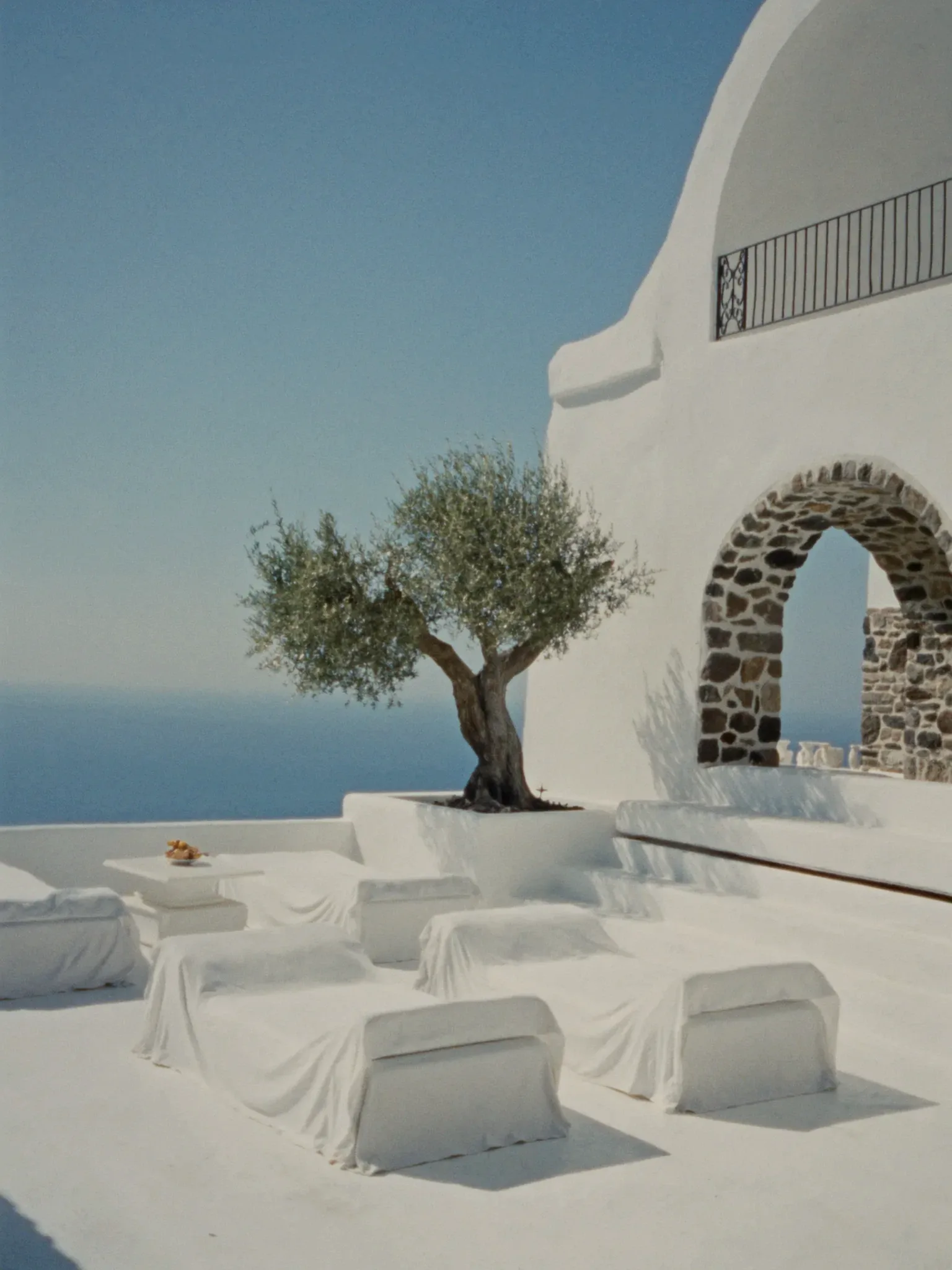 A whitewashed Mediterranean terrace overlooking the sea (placeholder)
